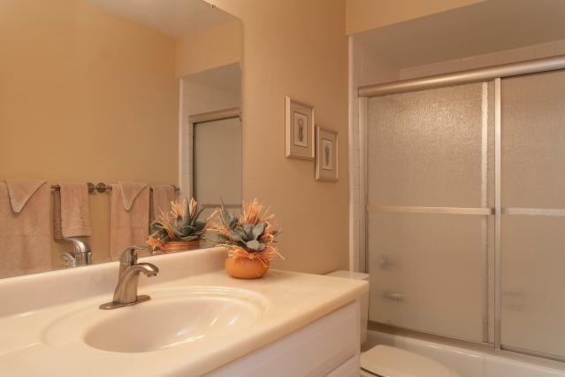 72300 Rodeo Way Rancho Mirage, CA 92270 - Photo 16 of 34 a bathroom with a sink and a mirror