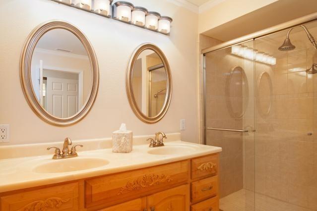 72300 Rodeo Way Rancho Mirage, CA 92270 - Photo 20 of 34 a bathroom with a sink and a mirror