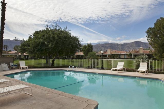 72300 Rodeo Way Rancho Mirage, CA 92270 - Photo 2 of 34 a view of a lake with a mountain in the background