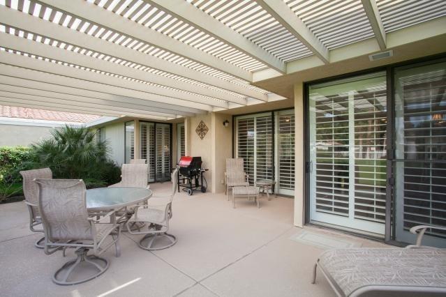 72300 Rodeo Way Rancho Mirage, CA 92270 - Photo 25 of 34 a view of a patio with furniture and tables