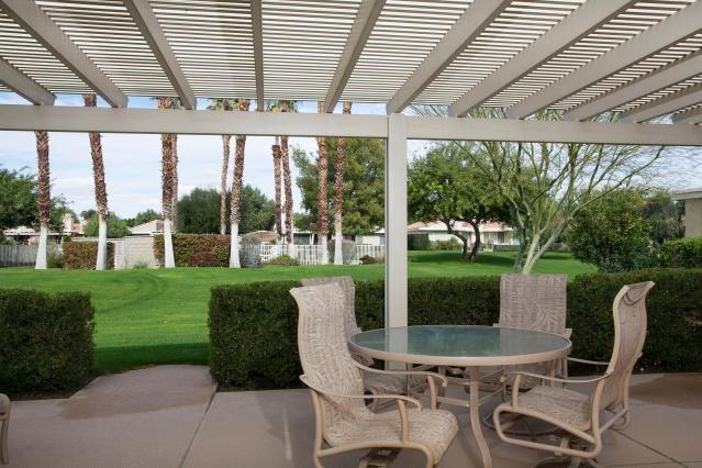 72300 Rodeo Way Rancho Mirage, CA 92270 - Photo 26 of 34 a view of a patio with a backyard