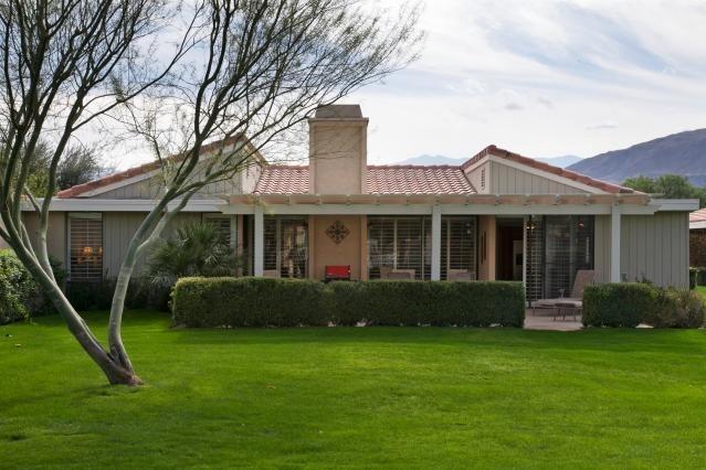 72300 Rodeo Way Rancho Mirage, CA 92270 - Photo 29 of 34 a front view of a house with a yard and porch