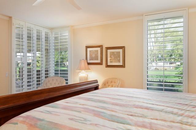 72300 Rodeo Way Rancho Mirage, CA 92270 - Photo 34 of 34 a bedroom with a bed and a large window
