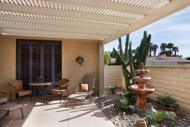 72300 Rodeo Way Rancho Mirage, CA 92270 - Photo 4 of 34 a living room filled with furniture