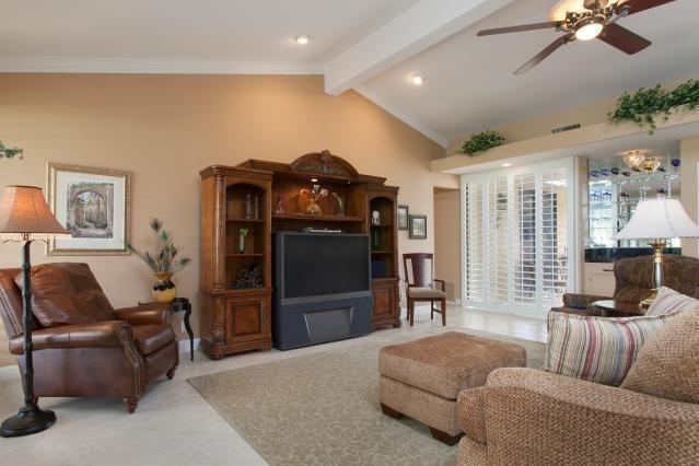 72300 Rodeo Way Rancho Mirage, CA 92270 - Photo 7 of 34 a living room with furniture and a flat screen tv