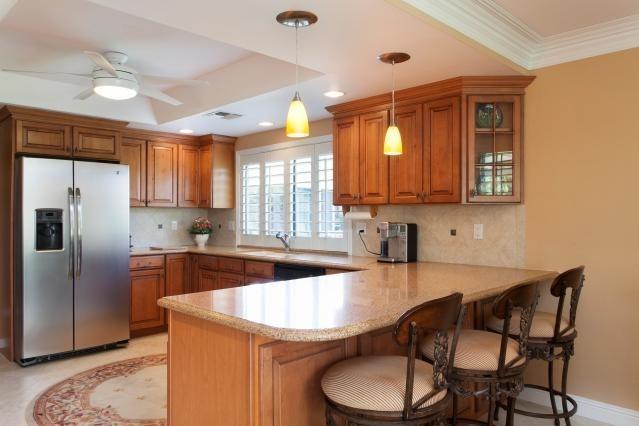 72300 Rodeo Way Rancho Mirage, CA 92270 - Photo 10 of 34 a kitchen with granite countertop a sink appliances and cabinets