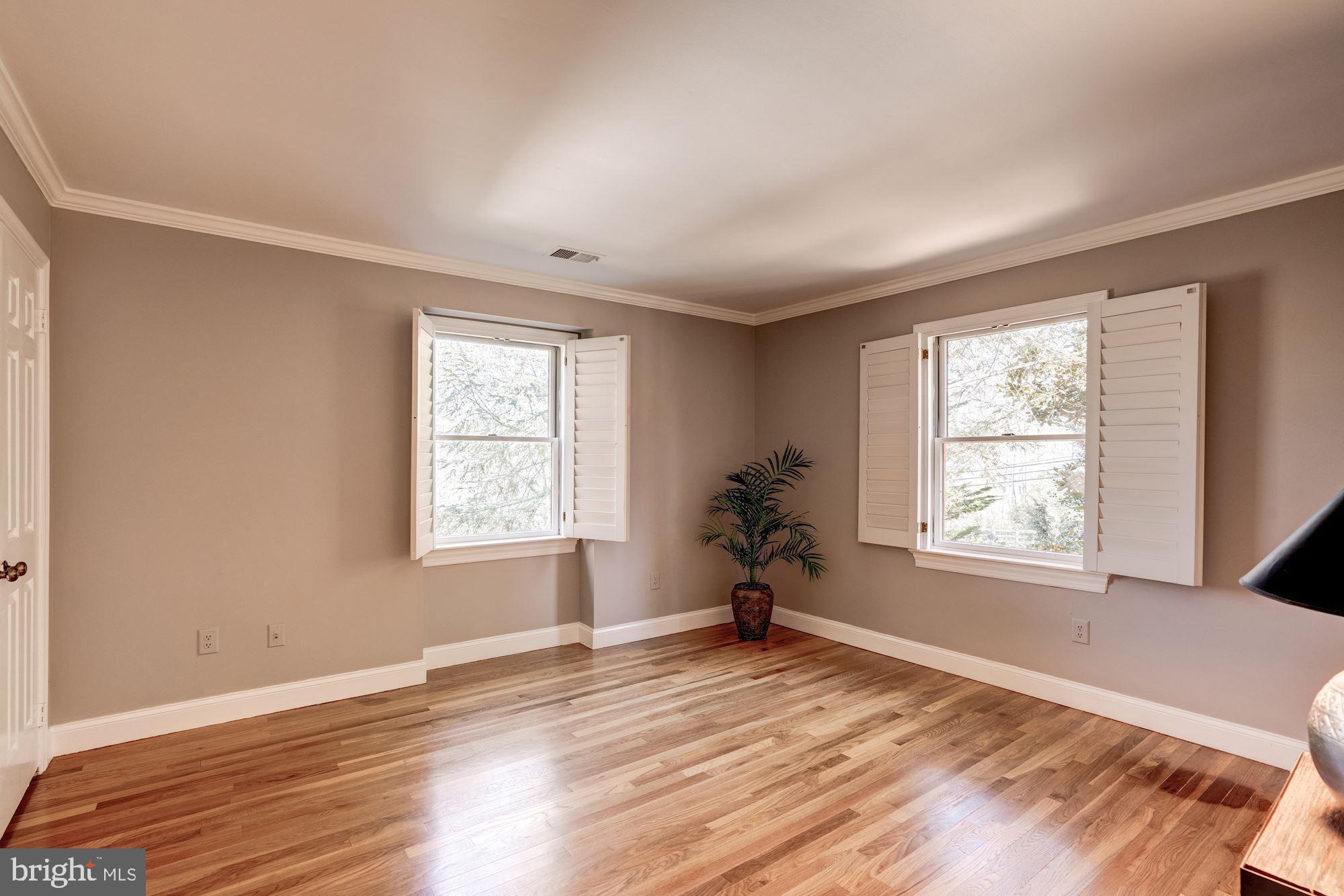 1124 Walker Road Great Falls, VA 22066 - Photo 17 of 30 Large second bedroom with wooded views.