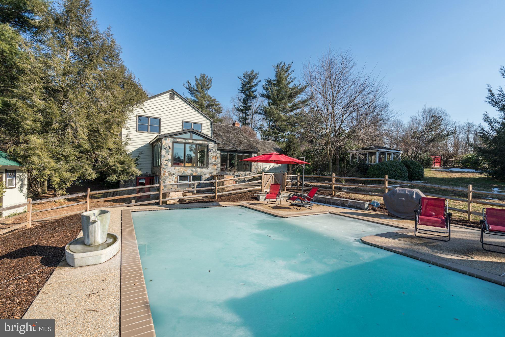 1124 Walker Road Great Falls, VA 22066 - Photo 27 of 30 Sylvan in-ground heated pool -- installed in 2017.