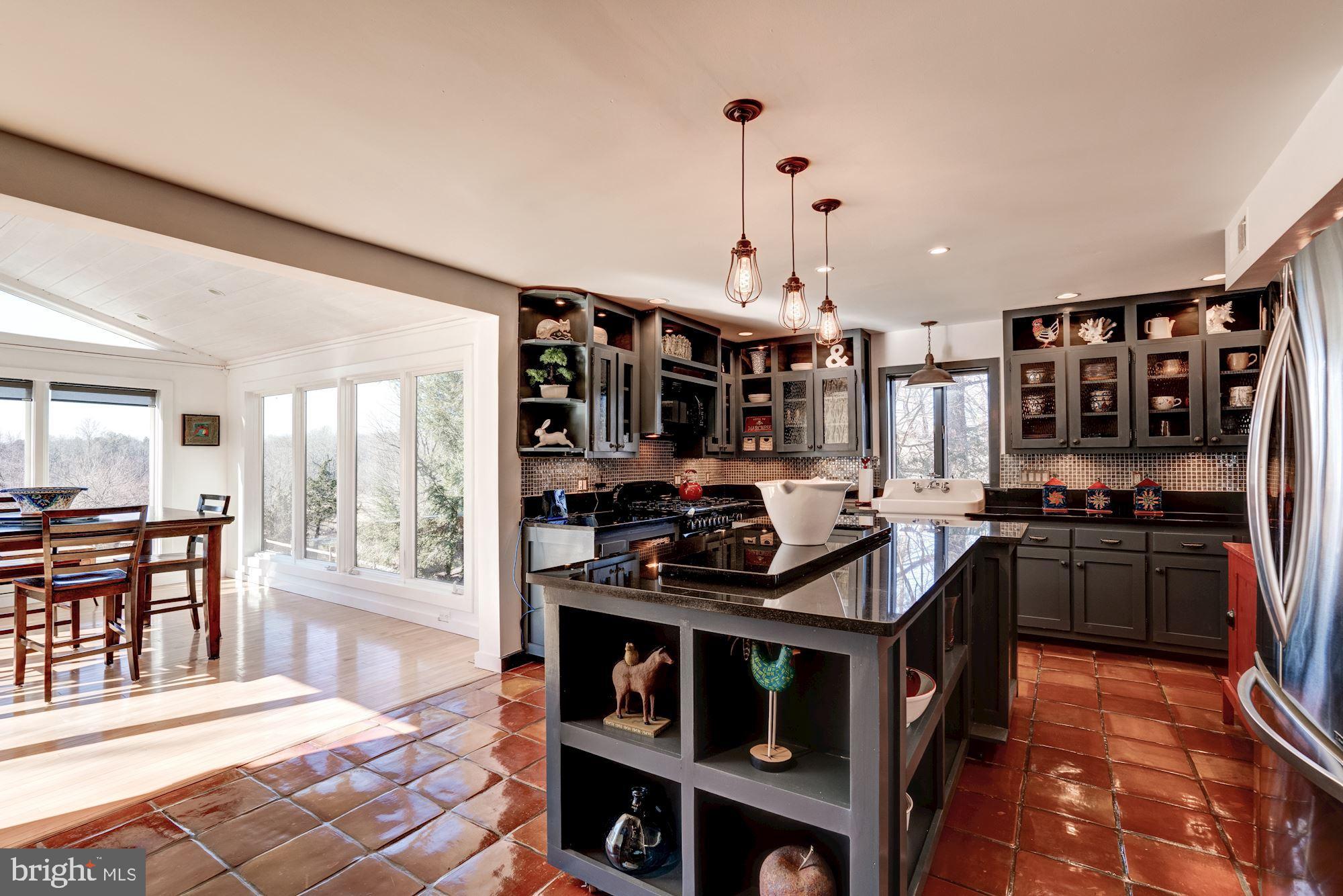 1124 Walker Road Great Falls, VA 22066 - Photo 7 of 30 Fabulous country kitchen open to sun room.