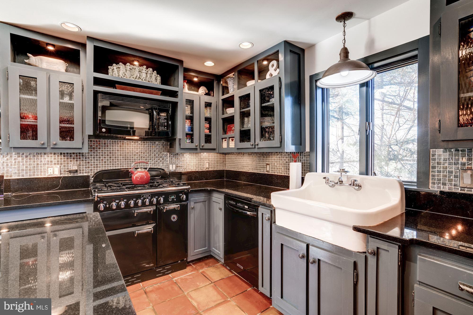 1124 Walker Road Great Falls, VA 22066 - Photo 8 of 30 Granite tops, porcelain sink, 5-burner Aga range.