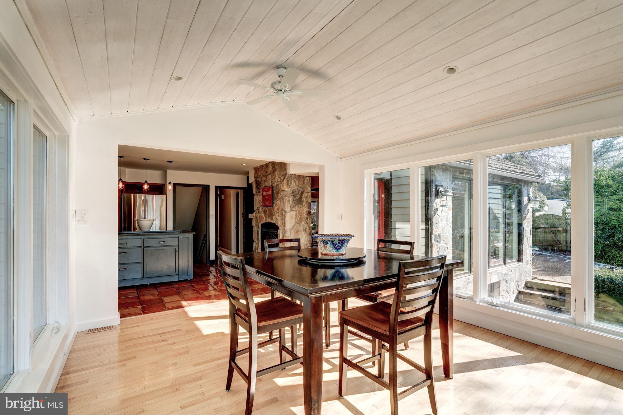 1124 Walker Road Great Falls, VA 22066 - Photo 9 of 30 Sun room with maple floors, ceiling fan.