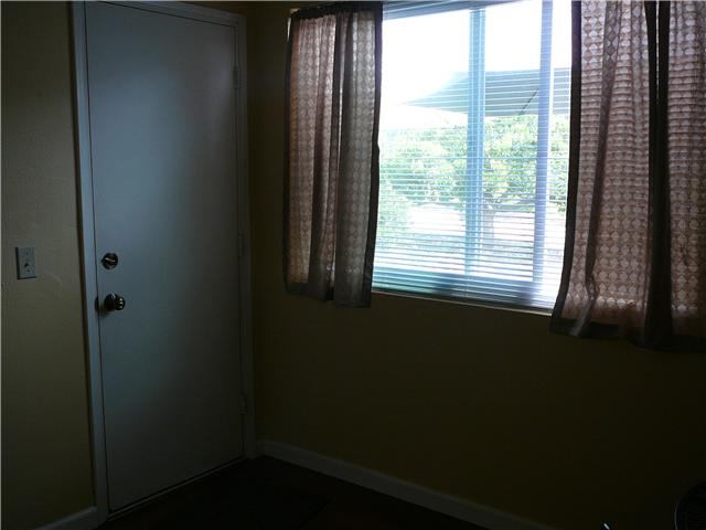 1452 Panorama Ridge Road Oceanside, CA 92056 - Photo 17 of 21 Bonus room has a window that allows nice airflow and light, room feels light and airy. Door leads out to backyard.