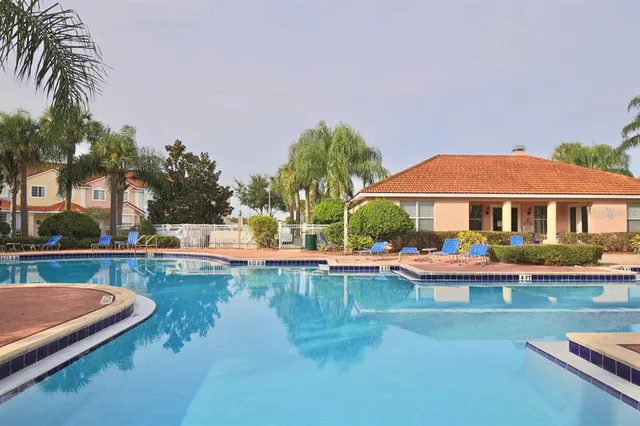 a view of a house with swimming pool