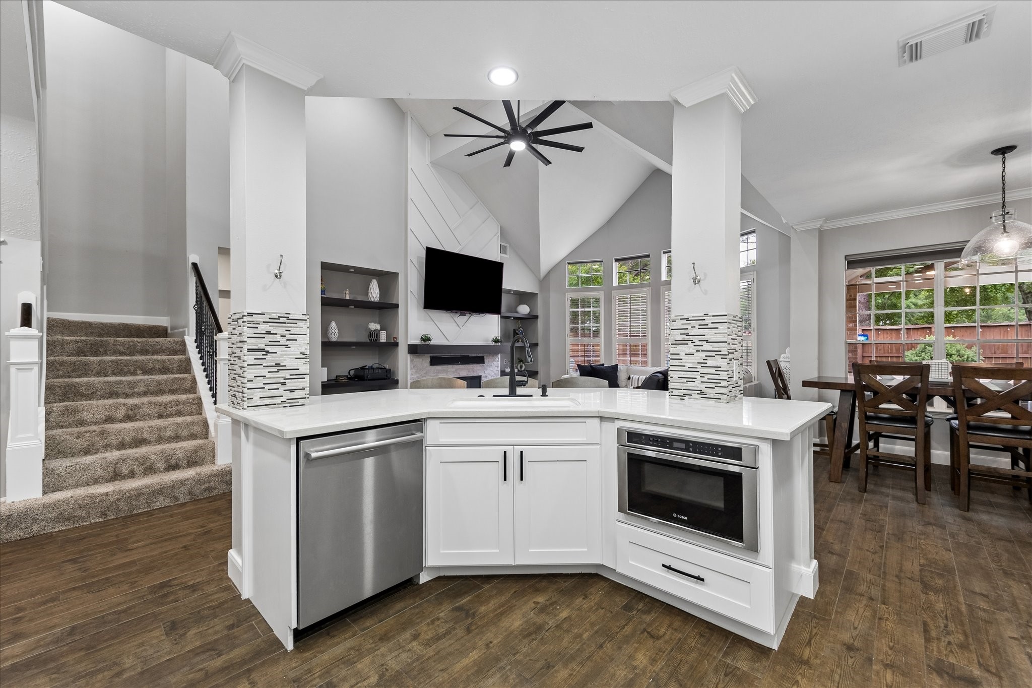 23039 Enchanted Landing Lane Katy, TX 77494 - Photo 10 of 30 a kitchen with white cabinets and white appliances