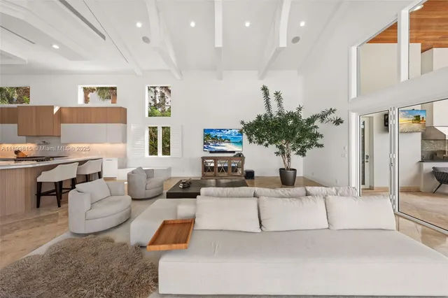 a view of a house with pool and a yard