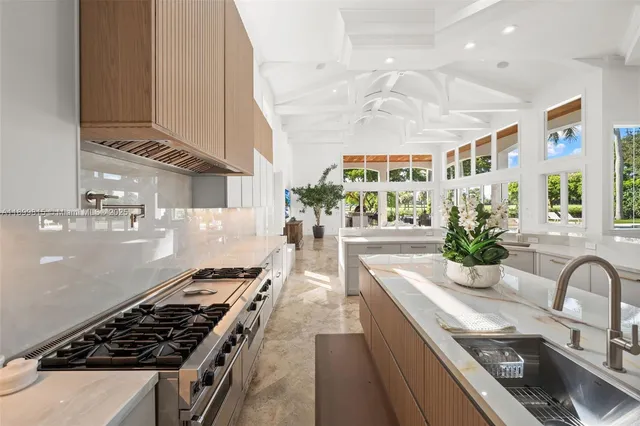 a view of a livingroom with furniture and a fireplace