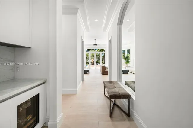 an aerial view of a houses with a yard