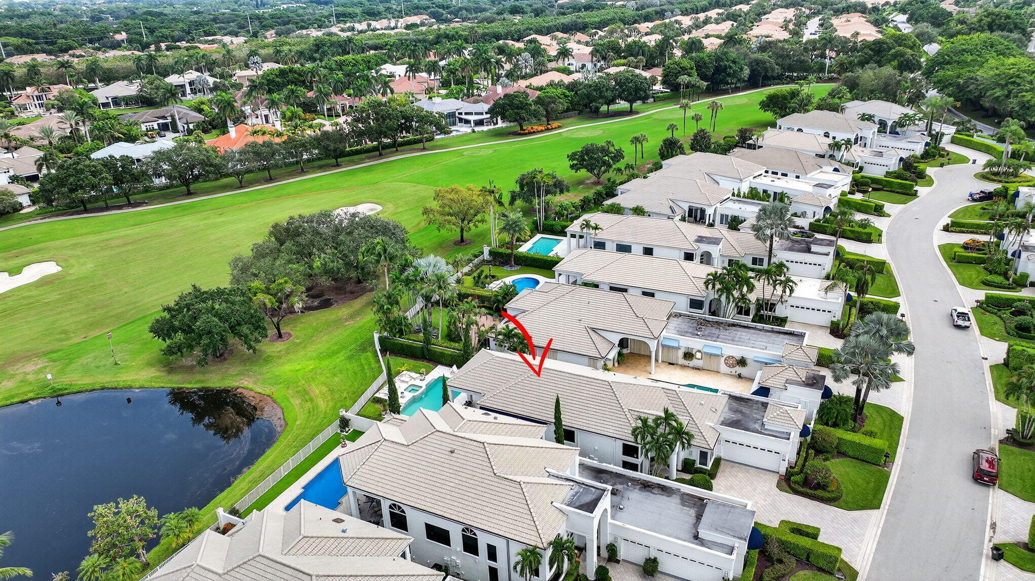 2563 Northwest 63rd Street Boca Raton, FL 33496 - Photo 61 of 65 an aerial view of a house with a garden