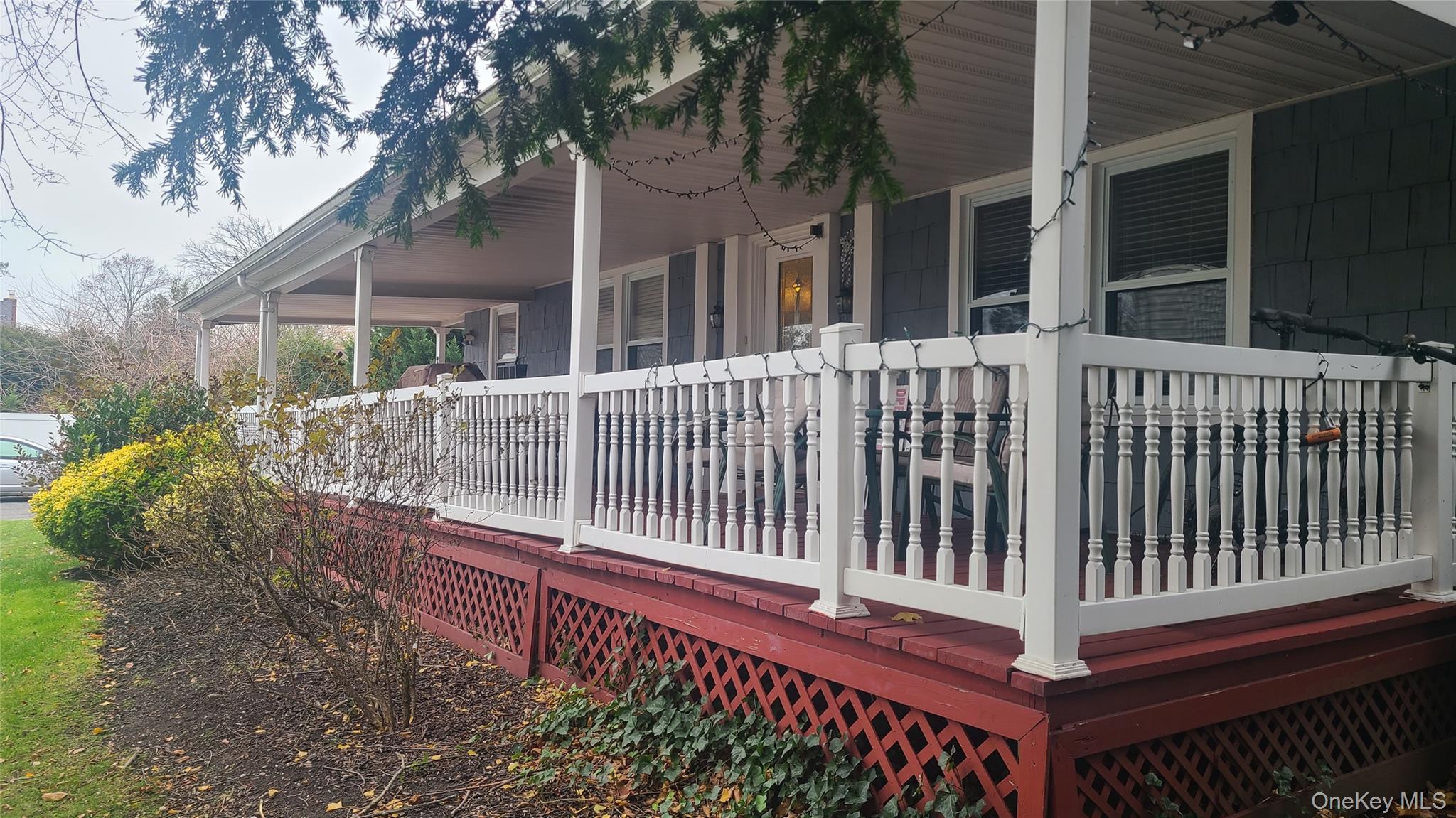 2 Addison Lane Greenvale, NY 11548 - Photo 18 of 18 a view of a bench with wooden fence