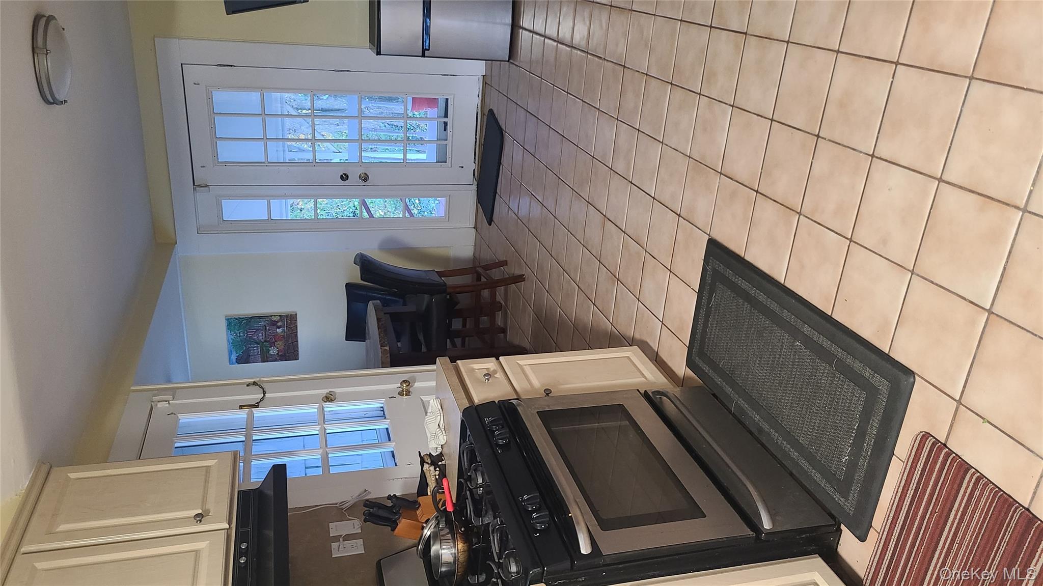 2 Addison Lane Greenvale, NY 11548 - Photo 6 of 18 a kitchen with stainless steel appliances granite countertop a stove a sink and a refrigerator
