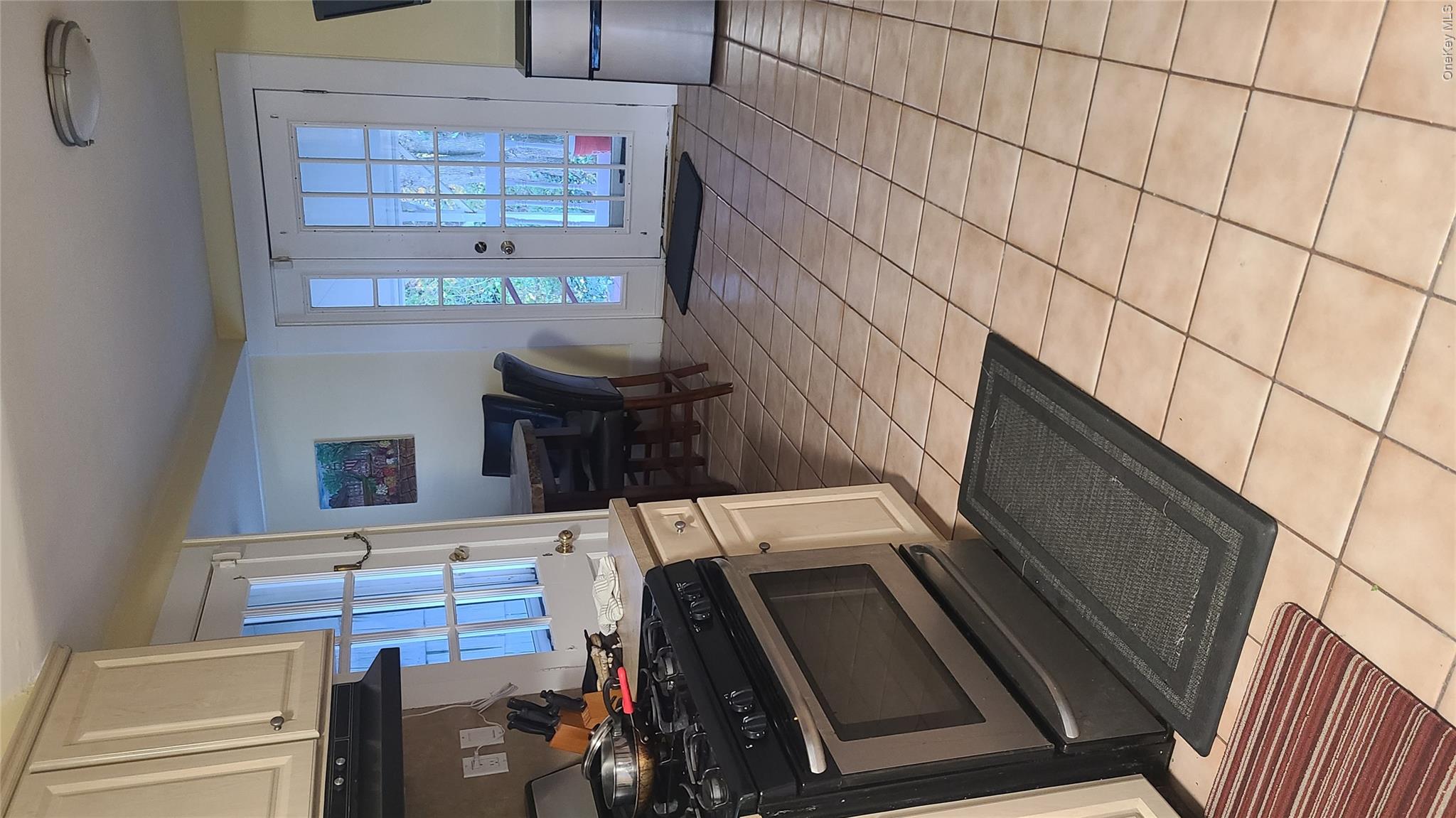 2 Addison Lane Greenvale, NY 11548 - Photo 6 of 18 a kitchen with stainless steel appliances granite countertop a stove a sink and a refrigerator