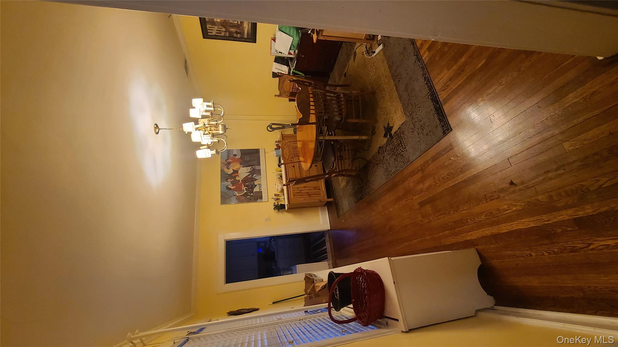 2 Addison Lane Greenvale, NY 11548 - Photo 9 of 18 a living room with couches chairs and a coffee table with wooden floor