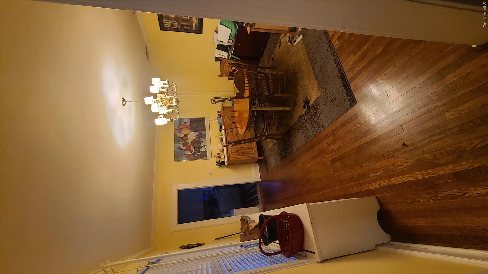 2 Addison Lane Greenvale, NY 11548 - Photo 9 of 18 a living room with couches chairs and a coffee table with wooden floor
