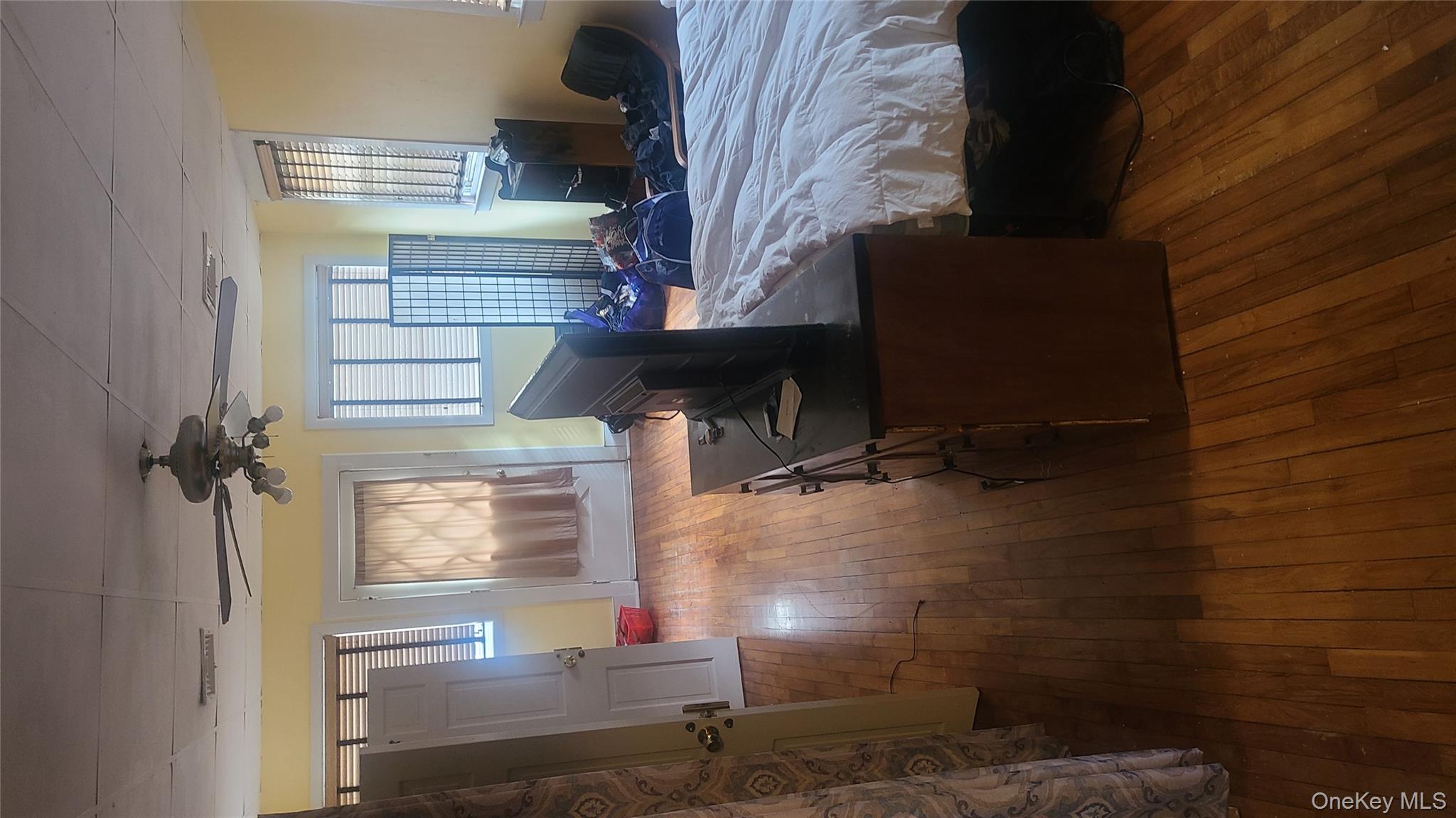 2 Addison Lane Greenvale, NY 11548 - Photo 10 of 18 a living room with furniture and a fireplace