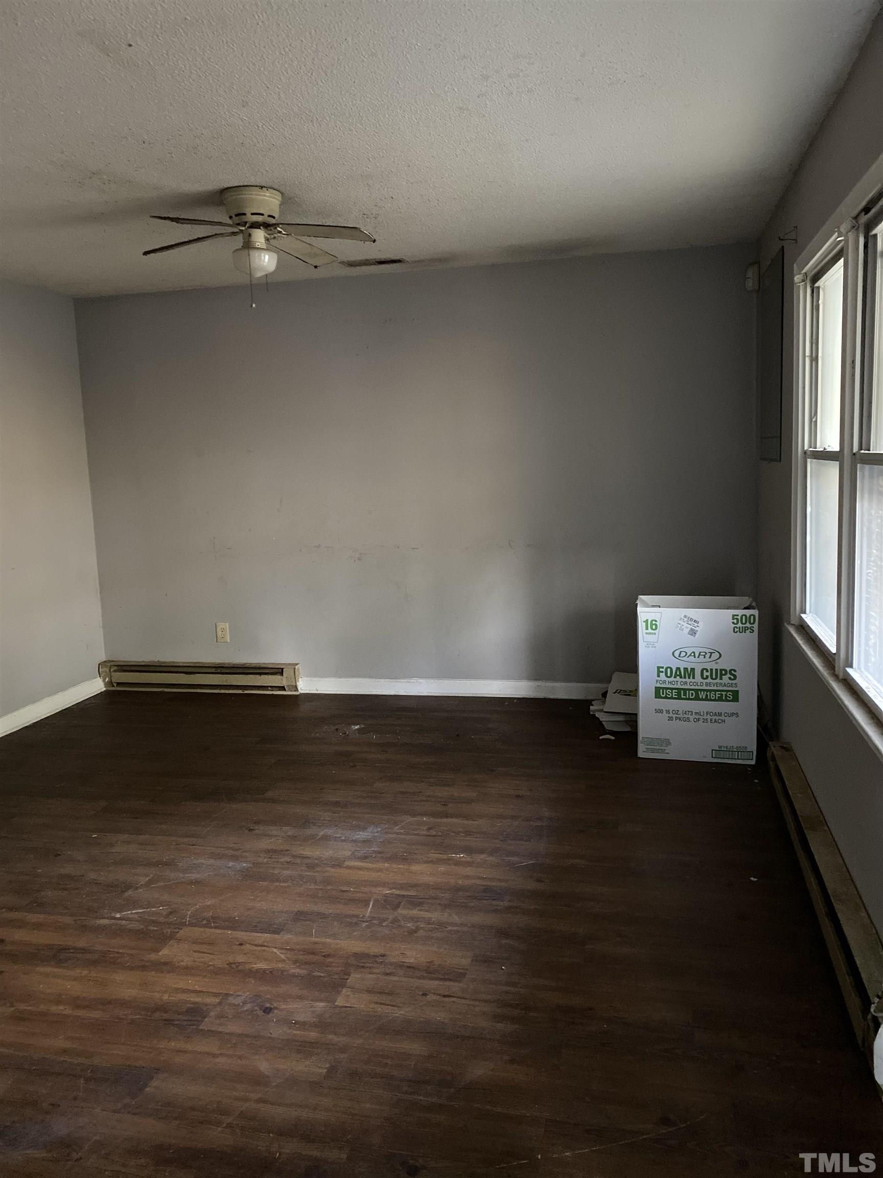 2428 Keith Drive Raleigh, NC 27610 - Photo 10 of 24 a view of room with window and wooden floor