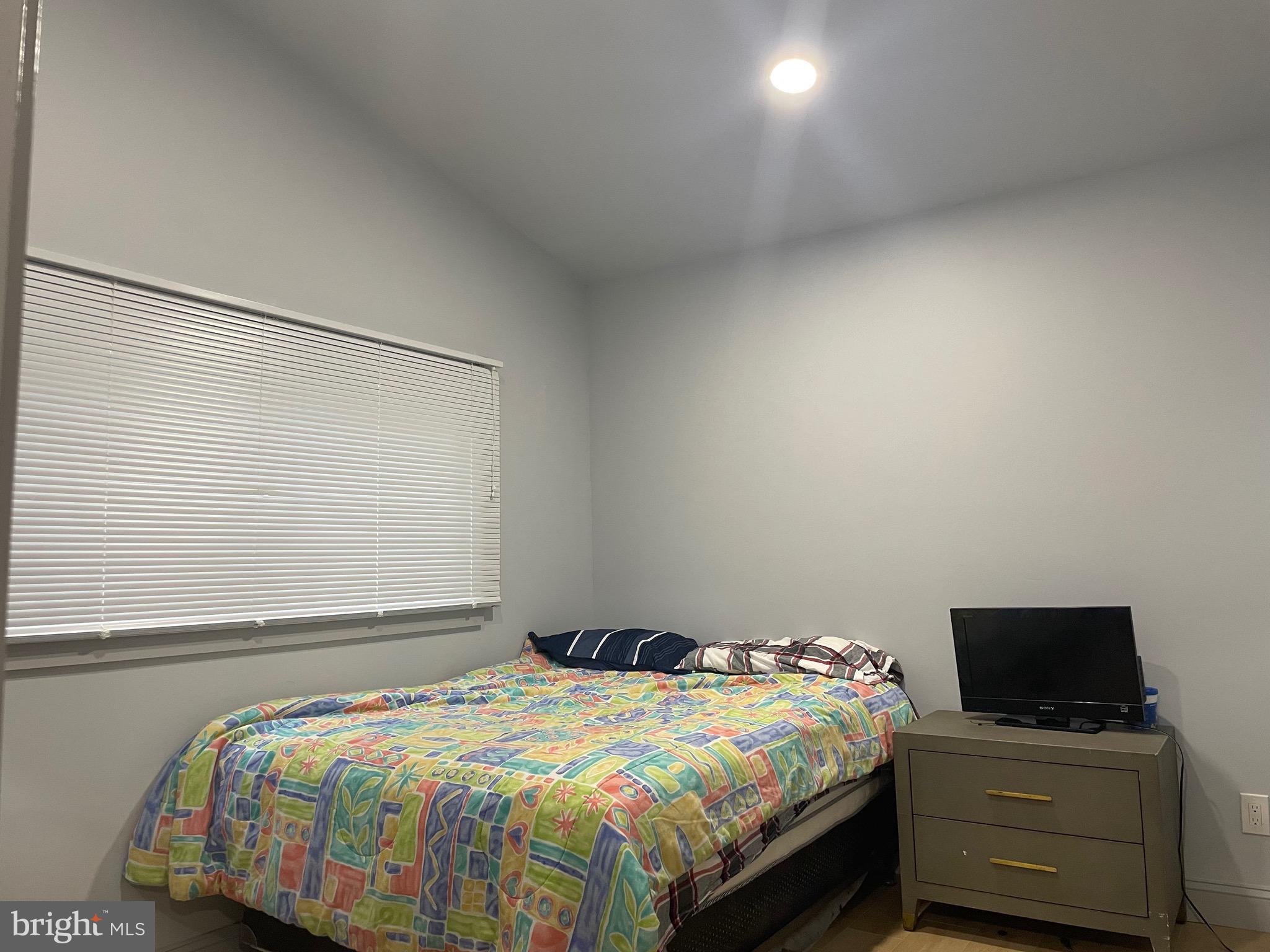 8 Ranger Road Falling Waters, WV 25419 - Photo 15 of 23 a bedroom with a bed and a tv