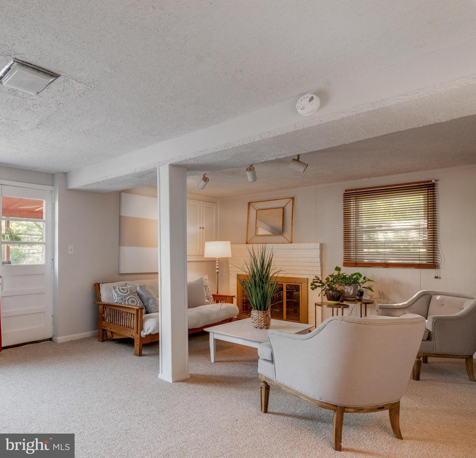 100 Margate Road Lutherville-Timonium, MD 21093 - Photo 20 of 34 Family room opens up to the screened porch