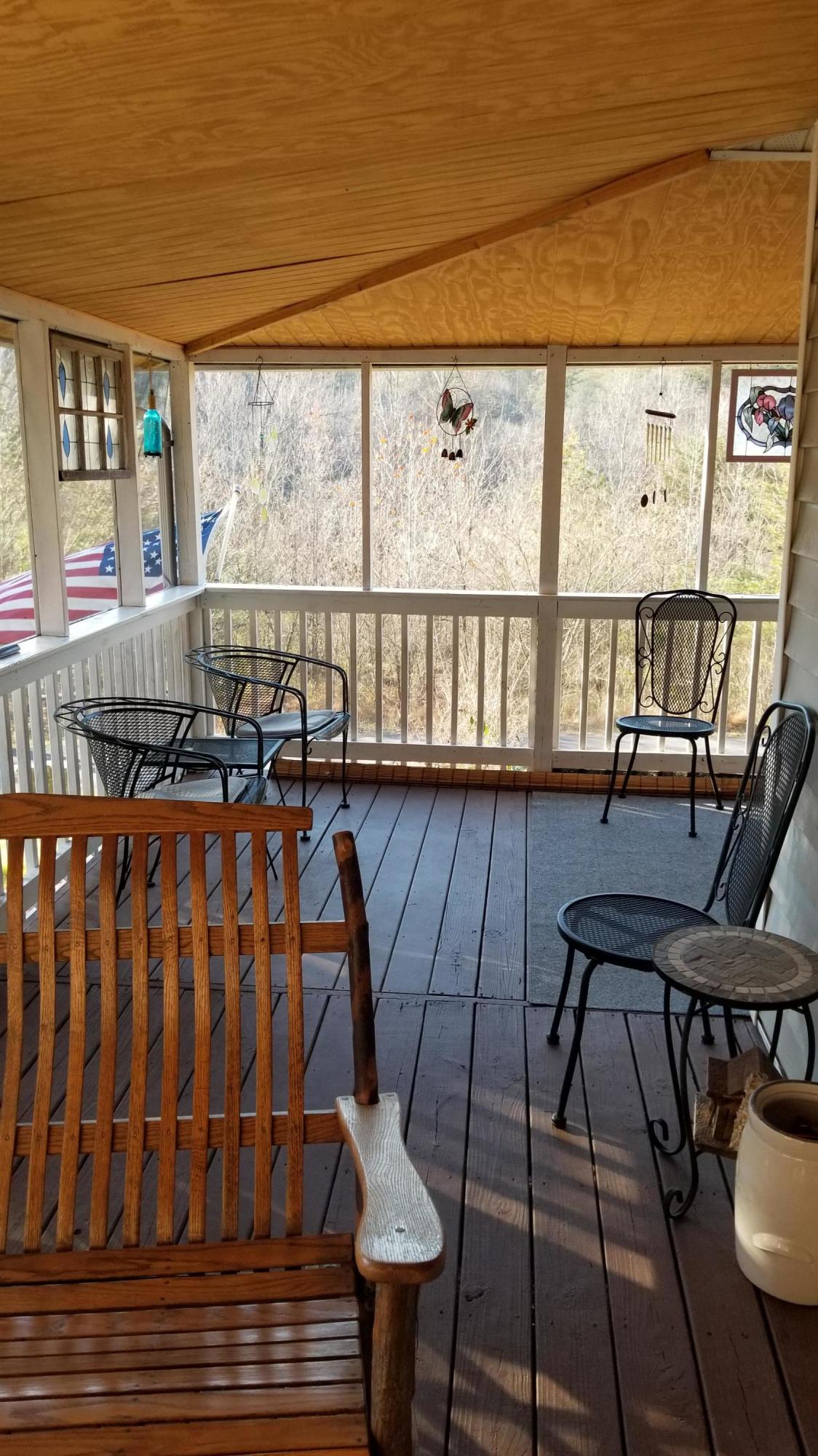 2708 Allegheny Loop Road Maryville, TN 37803 - Photo 13 of 32 Screened-in porch with Metal Roof
