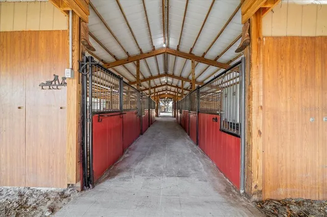 a blue house with trees in front of it