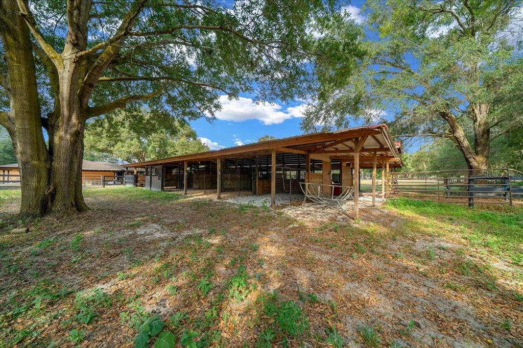 7380 Southwest 86th Lane Ocala, FL 34476 - Photo 36 of 56 a view of a house with a yard