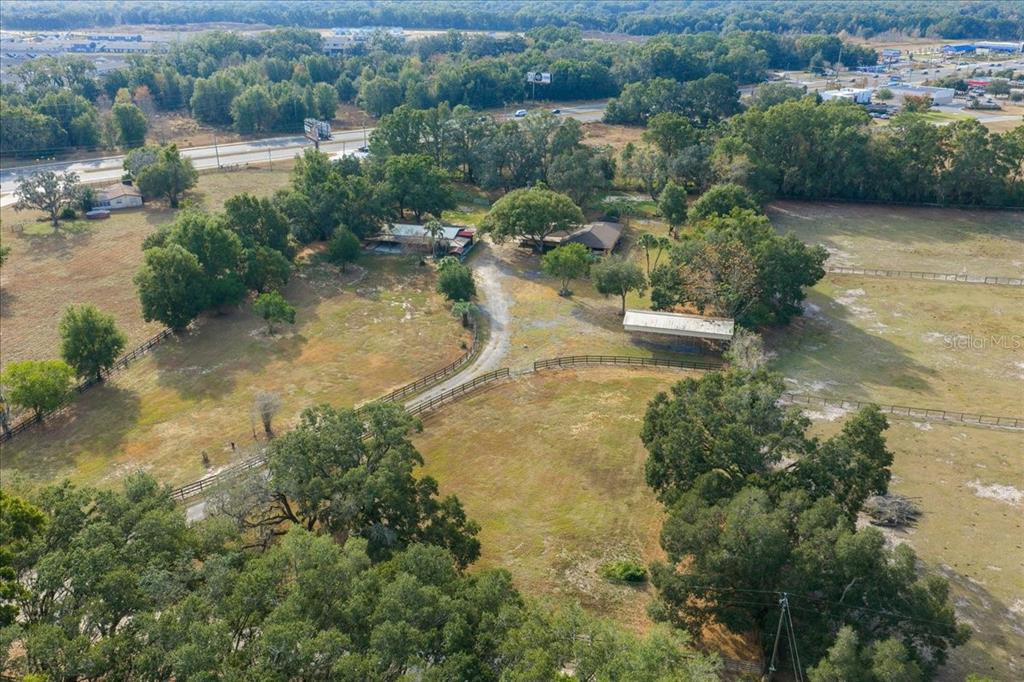 7380 Southwest 86th Lane Ocala, FL 34476 - Photo 45 of 50 an aerial view of residential house with outdoor space and lake view