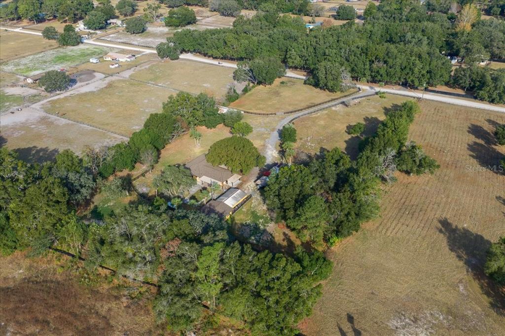 7380 Southwest 86th Lane Ocala, FL 34476 - Photo 46 of 50 an aerial view of a house with yard