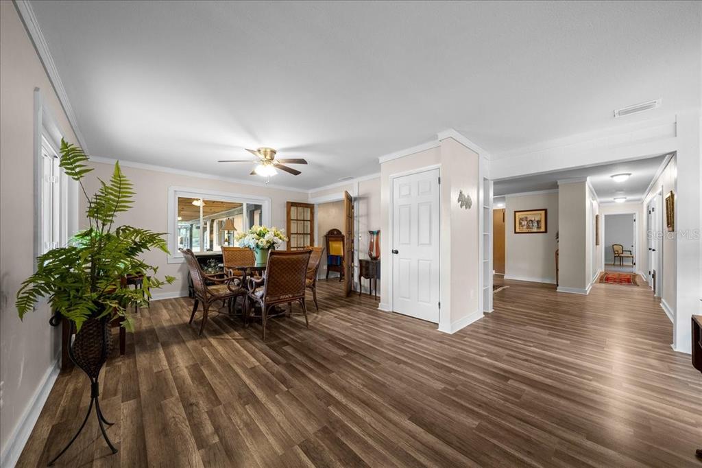 7380 Southwest 86th Lane Ocala, FL 34476 - Photo 8 of 56 a very nice looking room with many windows and furniture