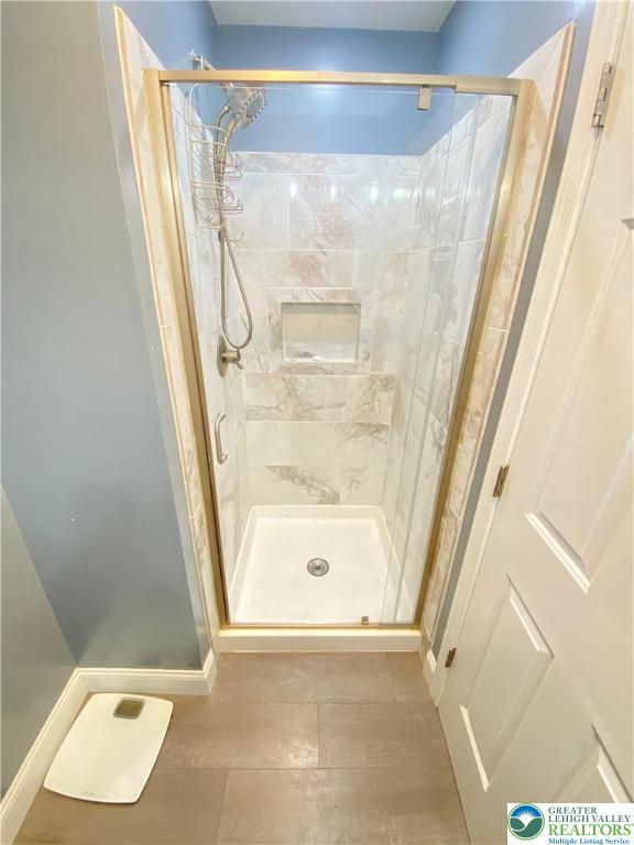4571 Newburg Road Nazareth, PA 18064 - Photo 15 of 29 a bathroom with a tub and a shower