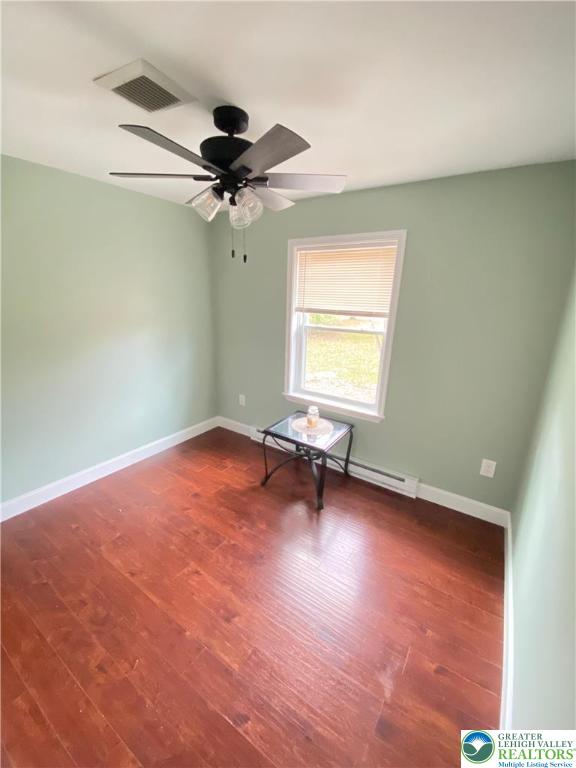 4571 Newburg Road Nazareth, PA 18064 - Photo 18 of 29 an empty room with windows and fan
