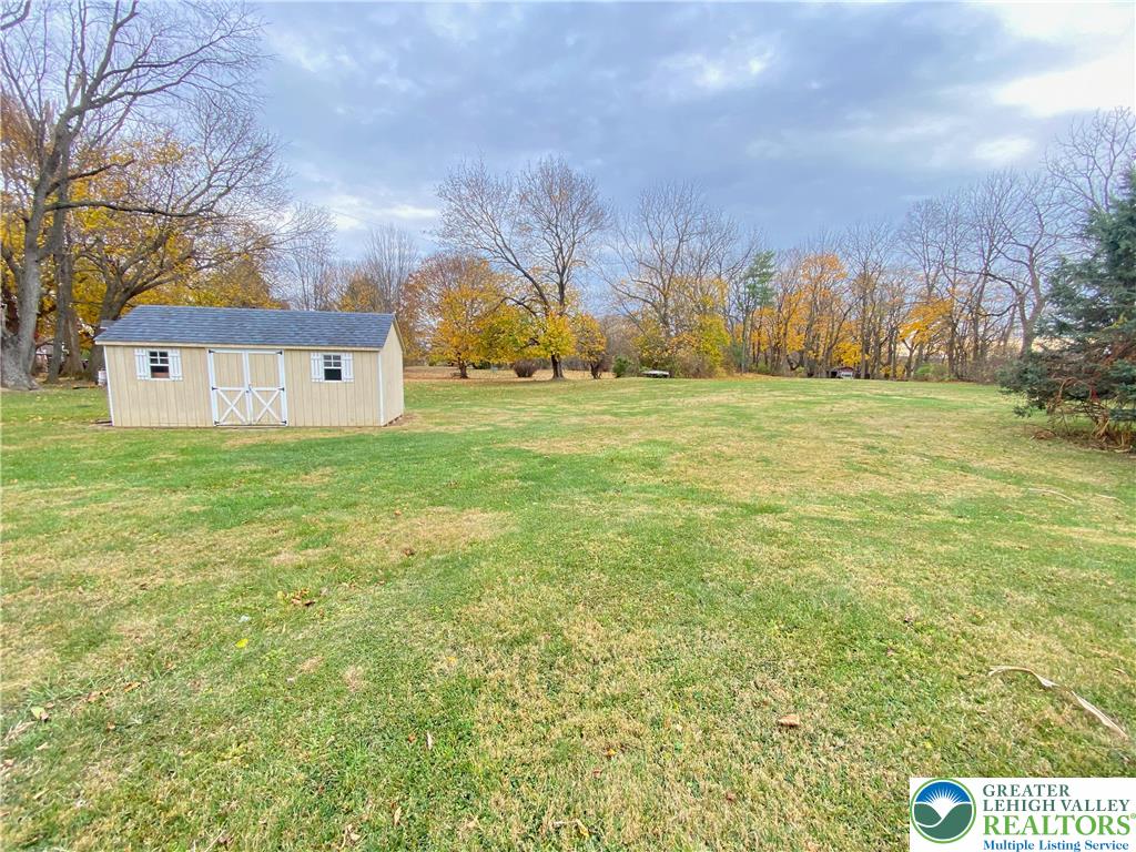 4571 Newburg Road Nazareth, PA 18064 - Photo 26 of 29 a view of big yard with an house and wooden fence
