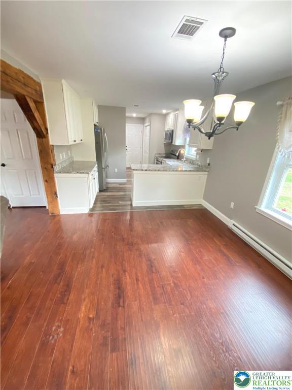 4571 Newburg Road Nazareth, PA 18064 - Photo 8 of 29 a view of a kitchen with cabinets and wooden floor