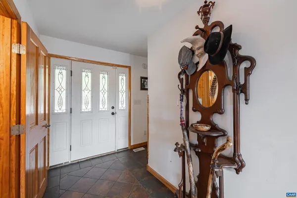 a kitchen with a stove a sink and a refrigerator