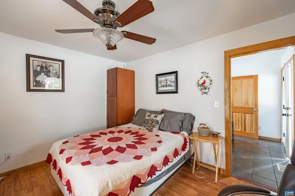 a kitchen with stainless steel appliances wooden cabinets a sink and a microwave