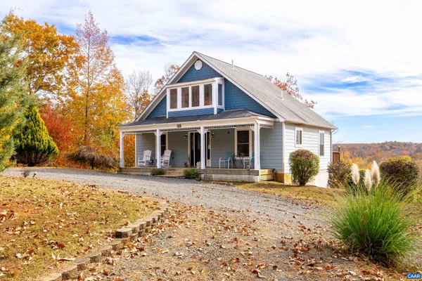 a front view of a house with a patio