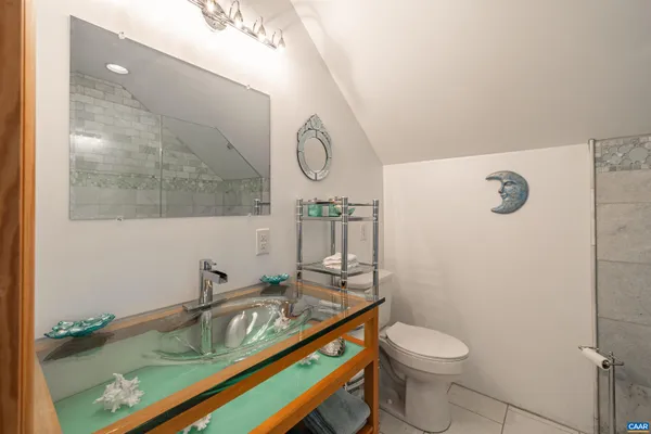 a room with lots of furniture and a large window