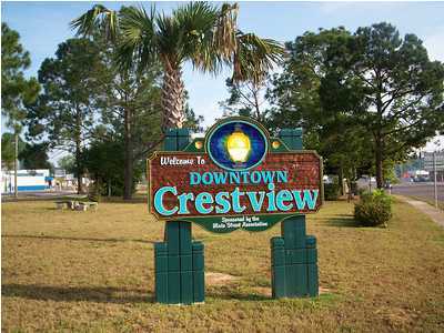 4305 Rebecca Road Crestview, FL 32539 - Photo 16 of 20 a sign that is on the side of a building