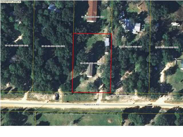 4305 Rebecca Road Crestview, FL 32539 - Photo 20 of 20 a view of swimming pool and a yard
