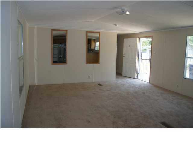 4305 Rebecca Road Crestview, FL 32539 - Photo 2 of 20 a black and white photo of a big room