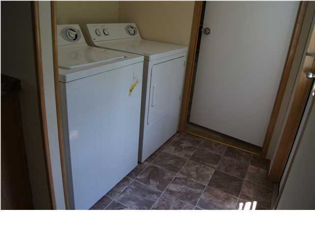 4305 Rebecca Road Crestview, FL 32539 - Photo 8 of 20 a room with dryer and washer