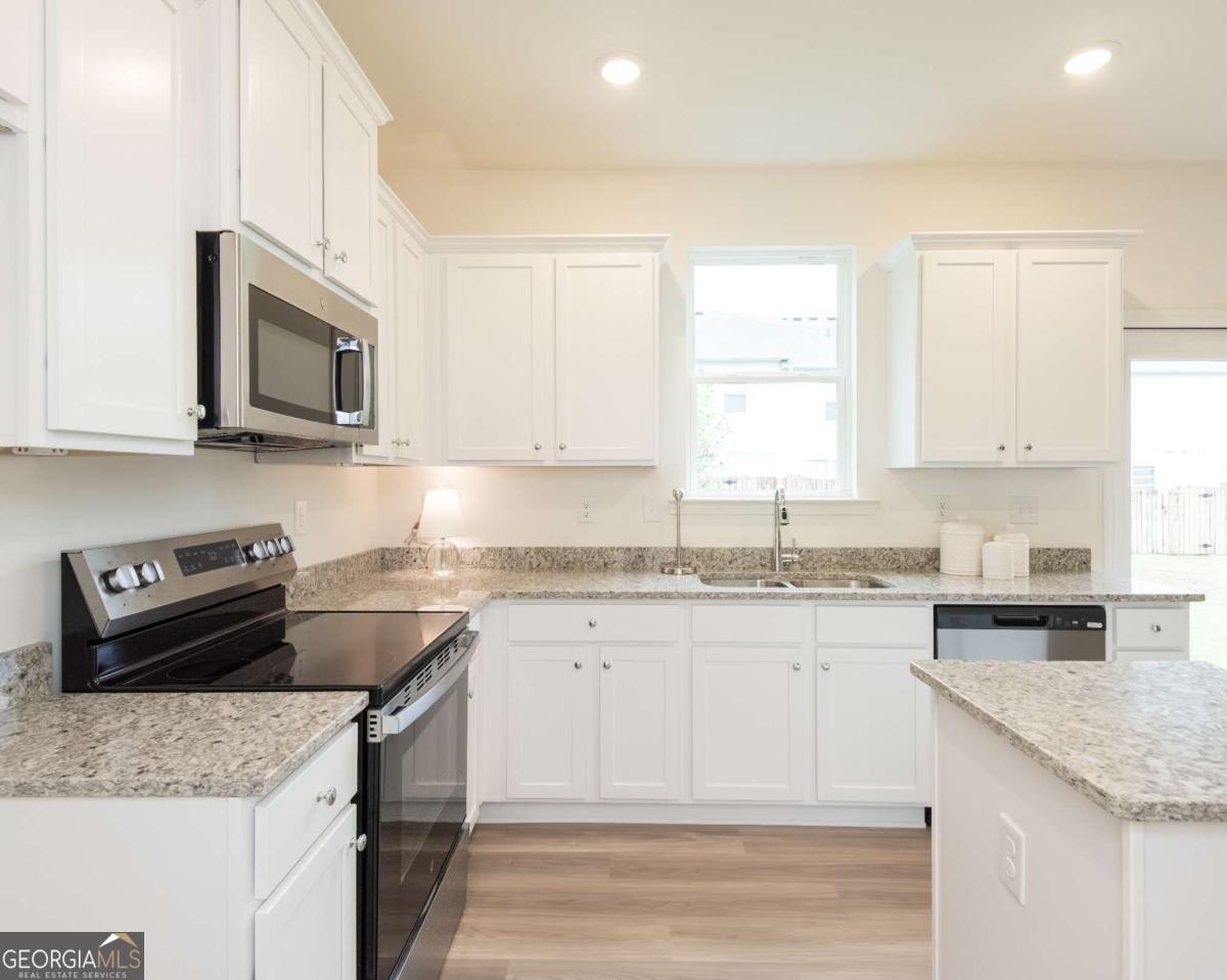 2561 Riverside Court Northeast Conyers, GA 30013 - Photo 11 of 37